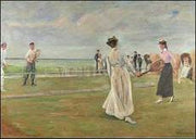 Tennisspelers aan het strand