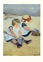 Kinderen spelend op het strand