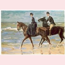 Horseman and horsewoman on the beach